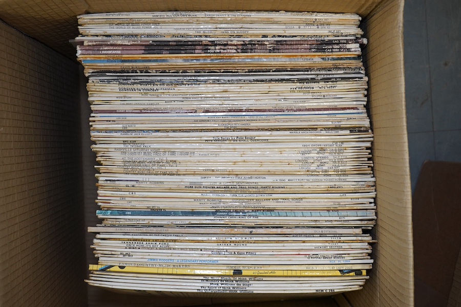 Two boxes of LP record albums, artists include; Billie Holiday, Jackie DeShannon, Timi Yuro, Connie Francis, Eddie Cochran, Gene Vincent, Hank Williams, Pete Seger, Donovan, Lindisfarne, etc. Condition - fair to good.